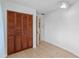 Bright bedroom with tile flooring, a ceiling fan, and a large closet at 856 Mendoza Dr, Kissimmee, FL 34758