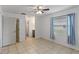 Comfortable bedroom with tile flooring and natural lighting at 856 Mendoza Dr, Kissimmee, FL 34758