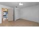 Bedroom features tile flooring, natural light, and a spacious closet at 856 Mendoza Dr, Kissimmee, FL 34758