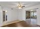 Bright dining room with tiled floors and a large sliding door to the enclosed sunroom at 856 Mendoza Dr, Kissimmee, FL 34758