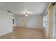 The open living room features tile flooring, natural lighting, and neutral walls at 856 Mendoza Dr, Kissimmee, FL 34758