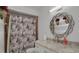 Charming bathroom featuring a vanity with decorative mirror and unique shower curtain at 874 Quarters Ct, Port Orange, FL 32129