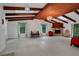 Bright, airy living room with high ceilings, stone fireplace, and modern decor at 874 Quarters Ct, Port Orange, FL 32129