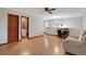 This loft features wood floors, a ceiling fan, and an open layout at 874 Quarters Ct, Port Orange, FL 32129