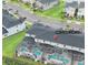 Aerial view showcases the community with private screened-in pools and well-maintained landscapes at 8961 Cabot Cliffs Dr, Davenport, FL 33896