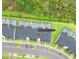Overhead shot of 8961 Cabot Cliffs Dr townhomes featuring private pools, parking, and green spaces at 8961 Cabot Cliffs Dr, Davenport, FL 33896