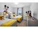 Charming ' bedroom with two twin beds, dresser and decor at 8961 Cabot Cliffs Dr, Davenport, FL 33896