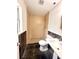 Bathroom with tile shower, toilet, and sink at 1001 Golfside Ct, Kissimmee, FL 34741