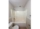 Bathroom features neutral wall color, tile floor, and a tub/shower combo at 1001 Golfside Ct, Kissimmee, FL 34741