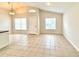 Spacious living area showcasing neutral walls, tile floors and natural light at 1001 Golfside Ct, Kissimmee, FL 34741
