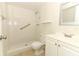 Bathroom featuring accessible walk-in shower, tile flooring, and large mirror at 1221 S Pine Ridge Cir # A2, Sanford, FL 32773
