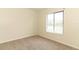 A comfortable bedroom with neutral carpet and natural light at 1221 S Pine Ridge Cir # A2, Sanford, FL 32773