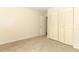 Bedroom features closet and neutral carpet at 1221 S Pine Ridge Cir # A2, Sanford, FL 32773