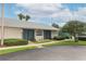 Exterior view of the Pine Ridge Village Clubhouse, a well-maintained building offering community amenities at 1221 S Pine Ridge Cir # A2, Sanford, FL 32773