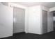 Condo hallway with a front door and a neutral color scheme, with carpeting at 1221 S Pine Ridge Cir # A2, Sanford, FL 32773