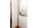 A laundry room featuring a stacked washer and dryer unit for convenience at 1221 S Pine Ridge Cir # A2, Sanford, FL 32773