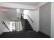 Stairwell with exit sign leading to unit 21 at 1221 S Pine Ridge Cir # A2, Sanford, FL 32773