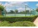 Well-maintained tennis court surrounded by greenery, providing residents with a recreational amenity at 1221 S Pine Ridge Cir # A2, Sanford, FL 32773