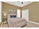 Inviting bedroom with a calming color palette, a comfortable bed, and plenty of natural light at 1375 Brayford Point, Deland, FL 32724