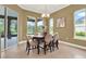 Charming dining area features views of the outdoor landscape and floods of natural light at 1375 Brayford Point, Deland, FL 32724