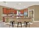 Kitchen with island, stainless steel appliances, ample storage, and tile backsplash at 1375 Brayford Point, Deland, FL 32724