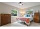 Serene bedroom featuring bright windows and tile floors at 1405 Montclair Ct, Orlando, FL 32812