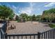 A wonderful community playground features slides, swings, and climbing structures under a bright sky, enhancing outdoor fun at 15318 Sandfield Loop, Winter Garden, FL 34787