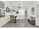 Charming bar area with nautical decorations and ample seating. Storage bench included at 15613 Camp Dubois Cres, Winter Garden, FL 34787