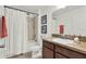 Bathroom vanity with a single sink and a combined shower and bathtub at 15613 Camp Dubois Cres, Winter Garden, FL 34787