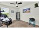 Bedroom with an office setup, natural light, and neutral color scheme at 15613 Camp Dubois Cres, Winter Garden, FL 34787