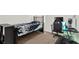 Comfortable bedroom with carpet flooring, a gaming setup, and a window for natural light at 15613 Camp Dubois Cres, Winter Garden, FL 34787