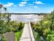 Stunning aerial view of a community dock that allows access to the lake at 15613 Camp Dubois Cres, Winter Garden, FL 34787