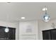 Stylish kitchen light fixtures illuminating the kitchen island and surrounding cabinets at 15613 Camp Dubois Cres, Winter Garden, FL 34787