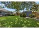 Large backyard featuring green grass, shed, and privacy fence at 1921 Geronimo Trl, Maitland, FL 32751