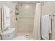 Well-maintained bathroom with tiled shower, fixtures, and neutral color palette at 1921 Geronimo Trl, Maitland, FL 32751