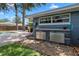 Outdoor kitchen area with stainless steel doors and countertop at 1921 Geronimo Trl, Maitland, FL 32751