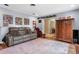 Well-decorated living room featuring a sliding barn door and warm, inviting decor at 1921 Geronimo Trl, Maitland, FL 32751