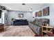 Comfortable living room with stylish seating, colorful artwork, and a cozy atmosphere at 1921 Geronimo Trl, Maitland, FL 32751