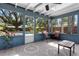 Relaxing view of pool and trees from the screened-in porch at 1921 Geronimo Trl, Maitland, FL 32751
