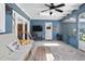 Screened-in porch with ceiling fan and lots of seating at 1921 Geronimo Trl, Maitland, FL 32751