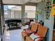 Relaxing outdoor patio with seating, a grill, and views of the surrounding neighborhood at 2474 Cimmaron Ash Way, Apopka, FL 32703