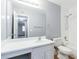 Bathroom features a white vanity, tiled floor, and bathtub with shower at 2520 Caper Ln # 206, Maitland, FL 32751