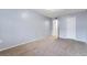 Spacious bedroom with neutral carpet and light gray walls, offering a blank canvas at 2520 Caper Ln # 206, Maitland, FL 32751