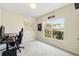 Bedroom equipped with a gaming desk, a map, and a window with natural light at 267 Williamson Dr, Davenport, FL 33897