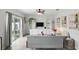 Stylish living room with sliding glass doors leading to the patio and a ceiling fan at 267 Williamson Dr, Davenport, FL 33897