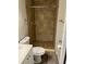 Tiled shower and updated fixtures highlight this cozy bathroom at 2776 Curry Ford Rd # Ge, Orlando, FL 32806