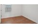 Bedroom with wood floors and a sunny window at 2926 Sailhouse Drive, St Cloud, FL 34771