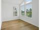 Bedroom with large windows offering a view of the outdoors and letting in lots of light at 2926 Sailhouse Drive, St Cloud, FL 34771