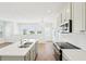 Modern kitchen features stainless steel appliances, island, and ample natural light at 2926 Sailhouse Drive, St Cloud, FL 34771