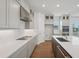Modern kitchen showcasing sleek countertops, stainless steel appliances, and ample cabinet space, ideal for culinary endeavors at 2926 Sailhouse Drive, St Cloud, FL 34771